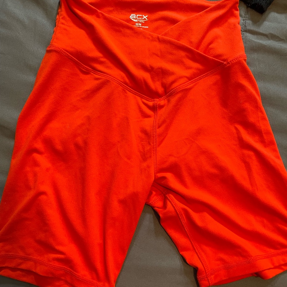 Women's orange mid Shorts